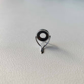 10 mm avskalningsguide för flugspö i svart onyx/agat / ram i blank nickelsilver